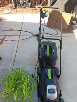 American Lawn Mower Company. 14 inches.  Electric. Comes with long power cord. Easy to push. Works great.