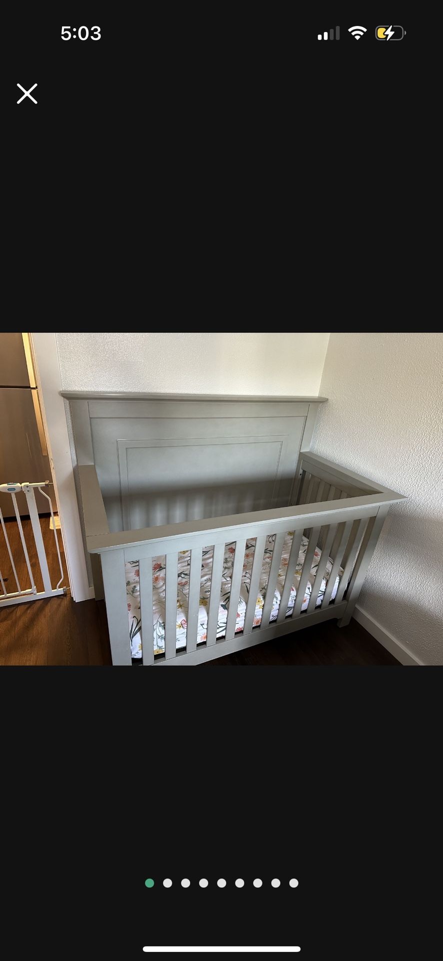 Grey baby crib