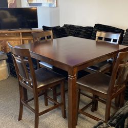 Ashley counter height table new ready for delivery $499 bring a truck or get new in box