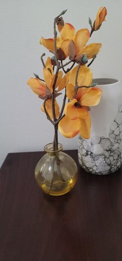 Yellow Flower Bowl And Golden Color Carpet