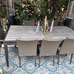 RST BRANDS Vistano 9-Piece Wicker Outdoor Dining Set with Canvas Flax Sunbrella Cushions