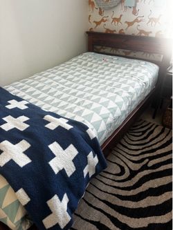 Two twin beds with dresser