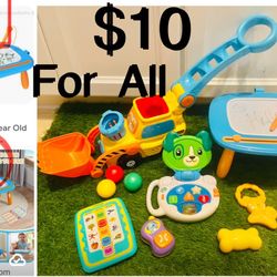 $10 Big Bundle of Baby Toys Leapfrog laptop, Vtech toy,drawing table/table and more