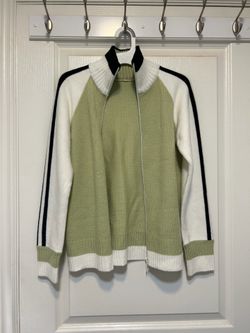 Green and white track jacket