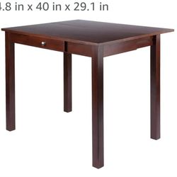 CONVERTIBLE WOOD HIGH TABLE.........NEW.....$ 100