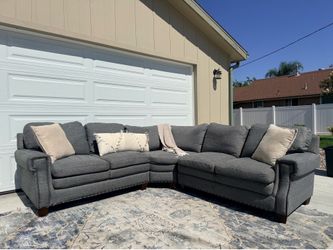 Living spaces gray sectional DELIVERY AVAILABLE