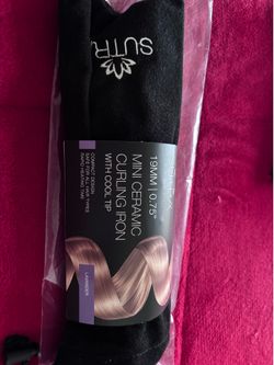 Brand new curling iron