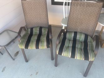 2  patio chairs and table