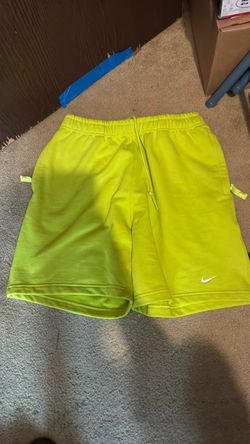 Nike Solo Swoosh Men's French Terry Shorts in the "Bright Cactus / White" colorway