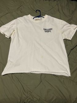 Gallery Dept. white t-shirt with black text reading