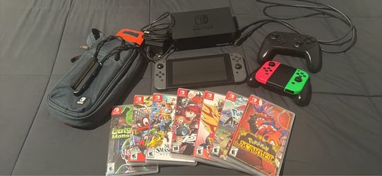Complete Nintendo Switch V2 Bundle - 256GB SD Card, extra Pair of Joy-Cons + pro controller + 7 games