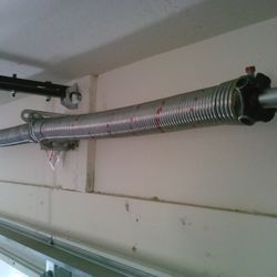 GARAGE DOOR SPRING REPLACEMENT 