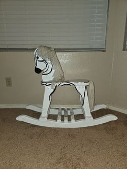 Read listing - zebra rocking horse