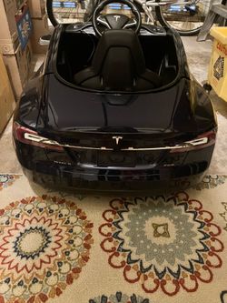 Tesla Model S Kids Electric Ride-On Car + Charger