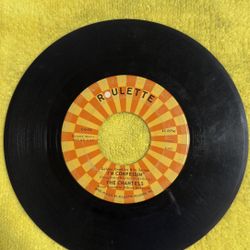 This item is a vintage 45 RPM vinyl record single of "I Love You So" by The Chantels, released on the Roulette Records label.