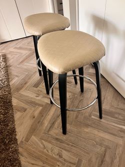 Barstools: tan quilted seat with black legs