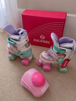 11c roller skates with hand, elbow and knee pads