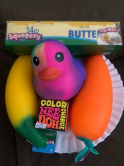 Squeeezy toys, butter, banana, carrot and duck Needoh color change ball