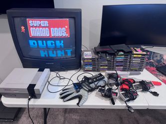 NES w/ 40 games, accessories and crt tv