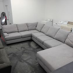 Light gray large sectional couch grey