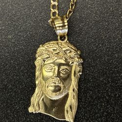 10k gold Jesus pendant with 2mm diamond cut Cuban curb