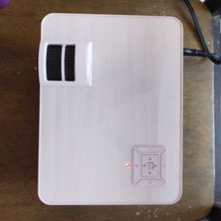 Projector with HDMI hookups and for a computer or laptop and a slot for SD cards