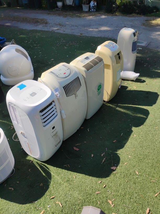 PORTABLE AIR CONDITIONERS/AIR CLEANERS AND HUMIDIFIER