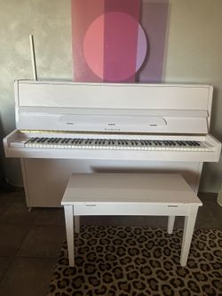White Upright Piano