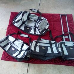 Brand New "Bella Russo"Luggage Set, Pick Up Only.