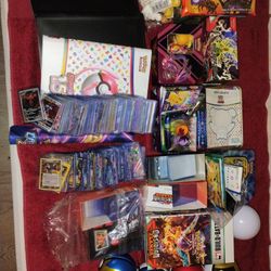 Collection of Pokemon items/cards