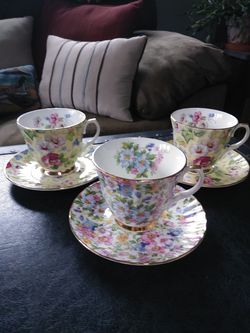 Beautiful tea cups with saucers