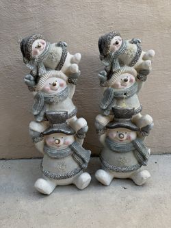 Set of two Festive Snowman Figurines with Gray and white Accents stacked in a playful design. Perfect for Christmas holiday decorations. Size: 71cm H 
