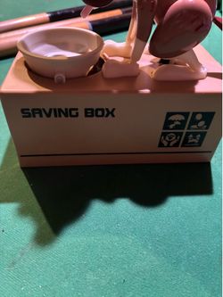 Robotic dog piggy bank