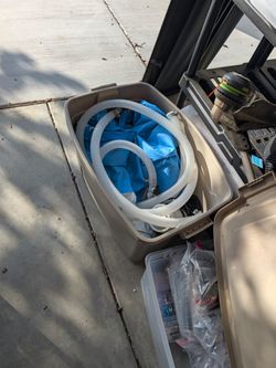 Inflatable above ground pool with pump