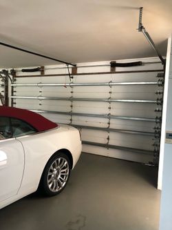Overhead Garage Door Spring Opener Off Track Adjustments Replace And Parts