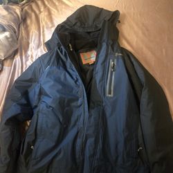 Free Country men's waterproof jacket with a removable hood and fleece lining. 