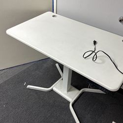 Table  46” x 26” - Electric  adjustable
