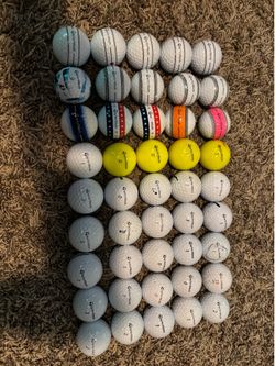 50 used Taylor Made golf balls