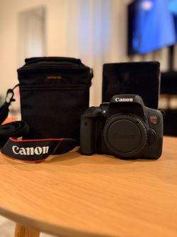 Canon EOS Rebel T6i DSLR video camera with Lens