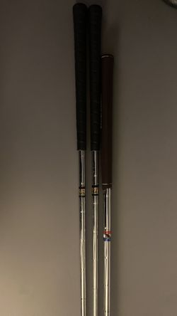 3 golf clubs