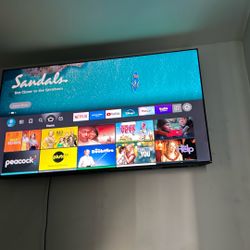 TCL 65 Inch + Tv mount 