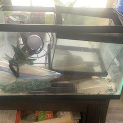 Two Fish Tanks And Reptile Accessories
