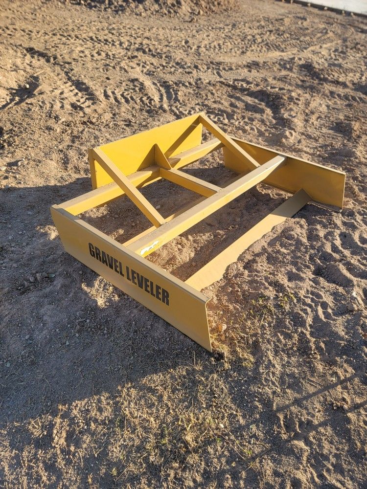 Gravel / land leveler Attachment for skid steer