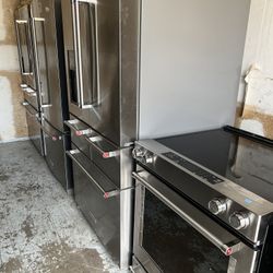 KitchenAid French Door Refrigerator And Glass Stove And Dishwasher 