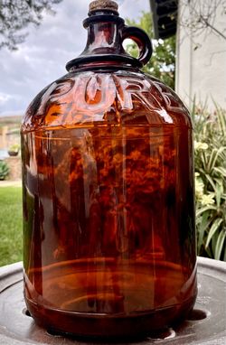 Vintage Embossed Amber Glass Purex Bleach Jug with Metal Cap