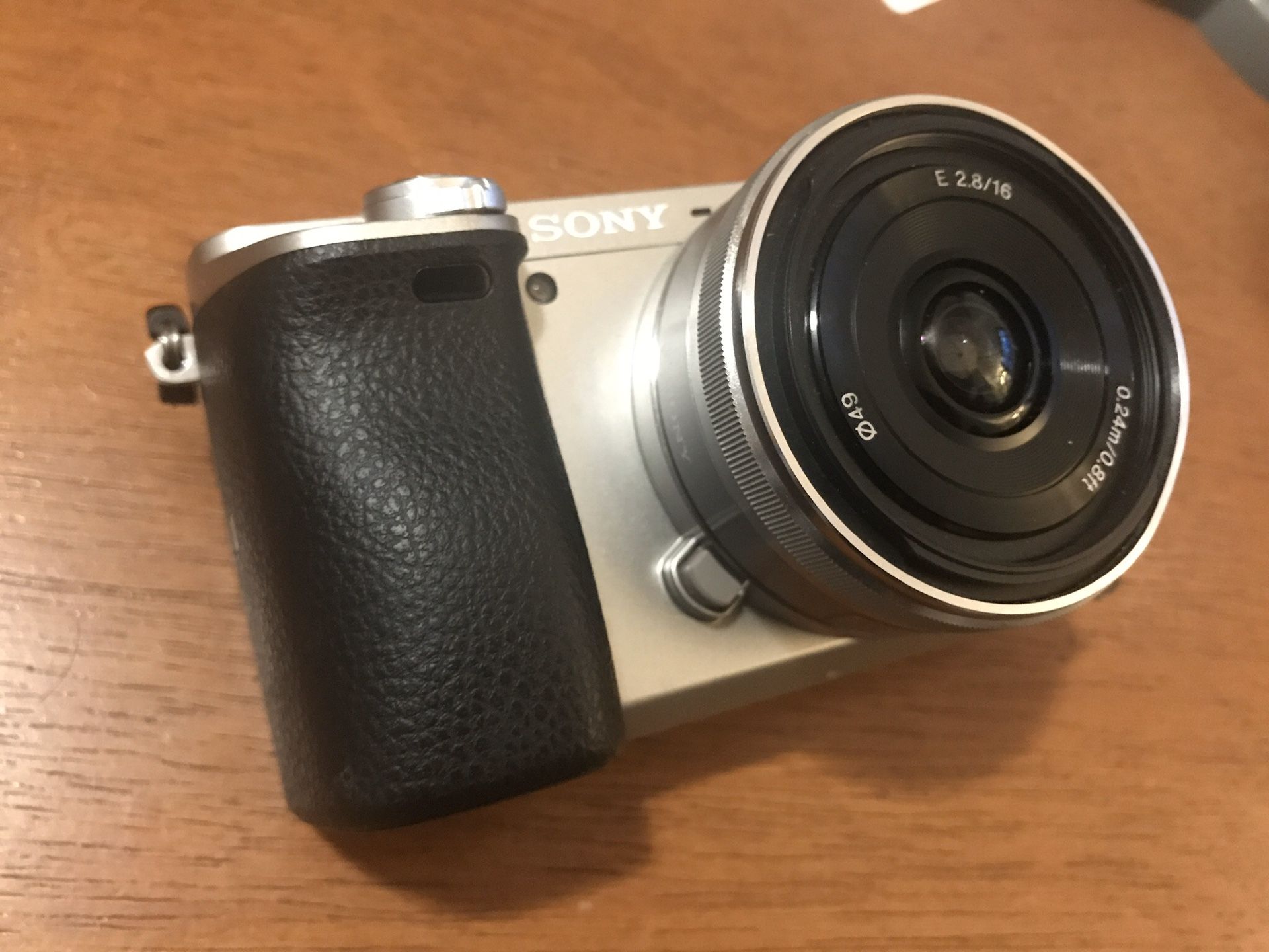 Sony Alpha a6000 Mirrorless Camera with Leather Case & AC Power Cable