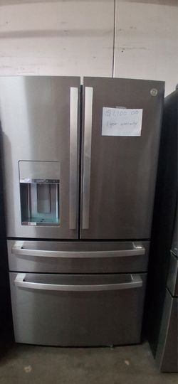 New GE refrigerator w/ 1 year warranty