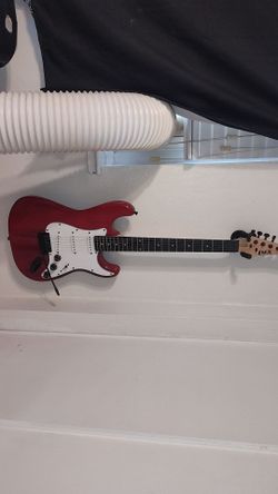 Red beginner guitar
