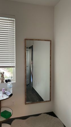 Gold accent floor mirror