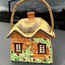 Vintage Thatched Roof Cookie Jar, Occupied Japan, 6 3/4” x 5 1-2”, 8” tall not including rattan handle height 